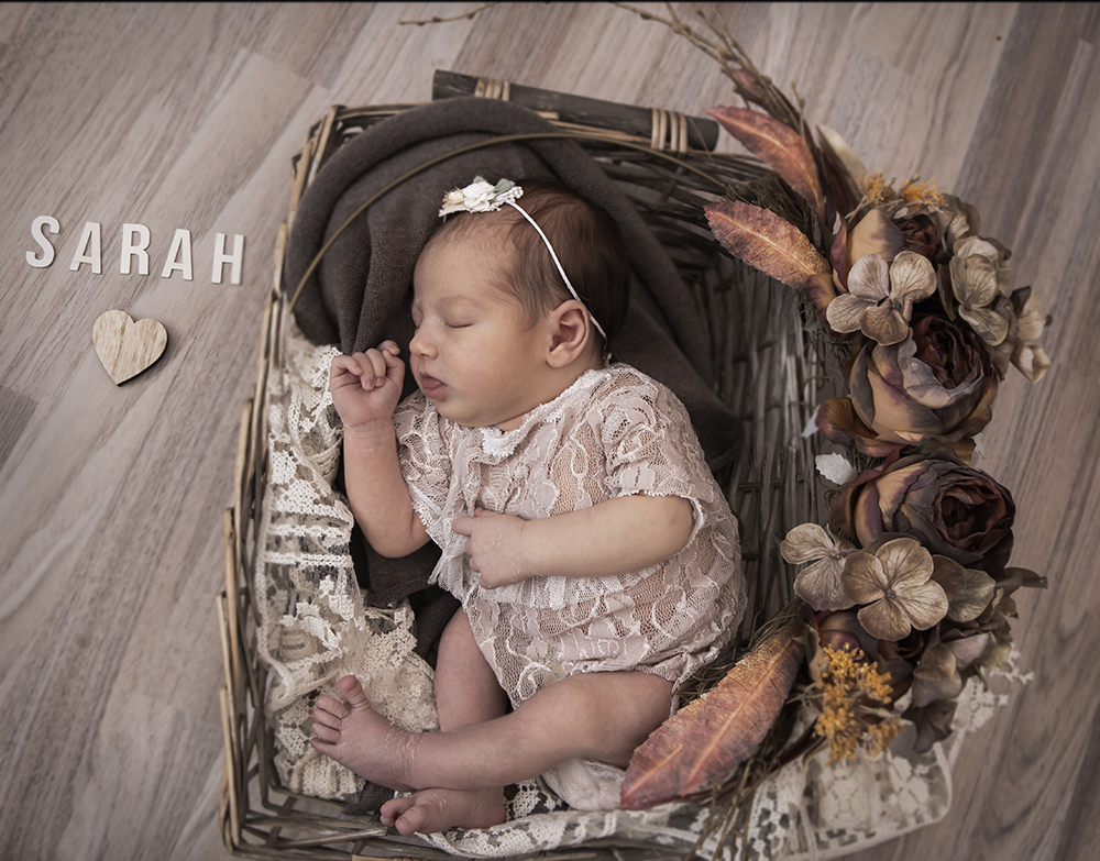 Herzlich willkommen im zauberhaften Service für Neugeborenenfotografie