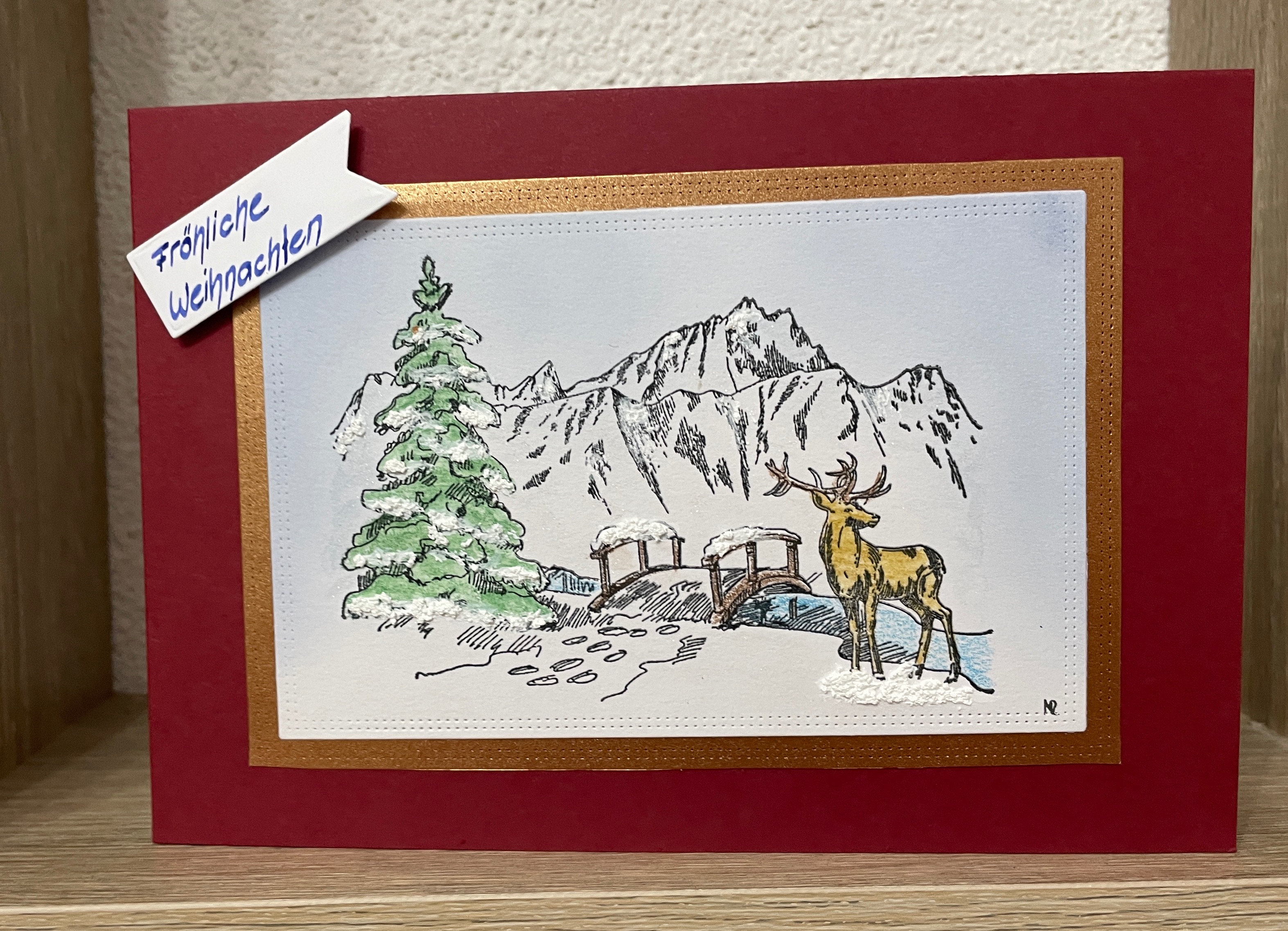 Winterlandschaft mit einem Hirsch