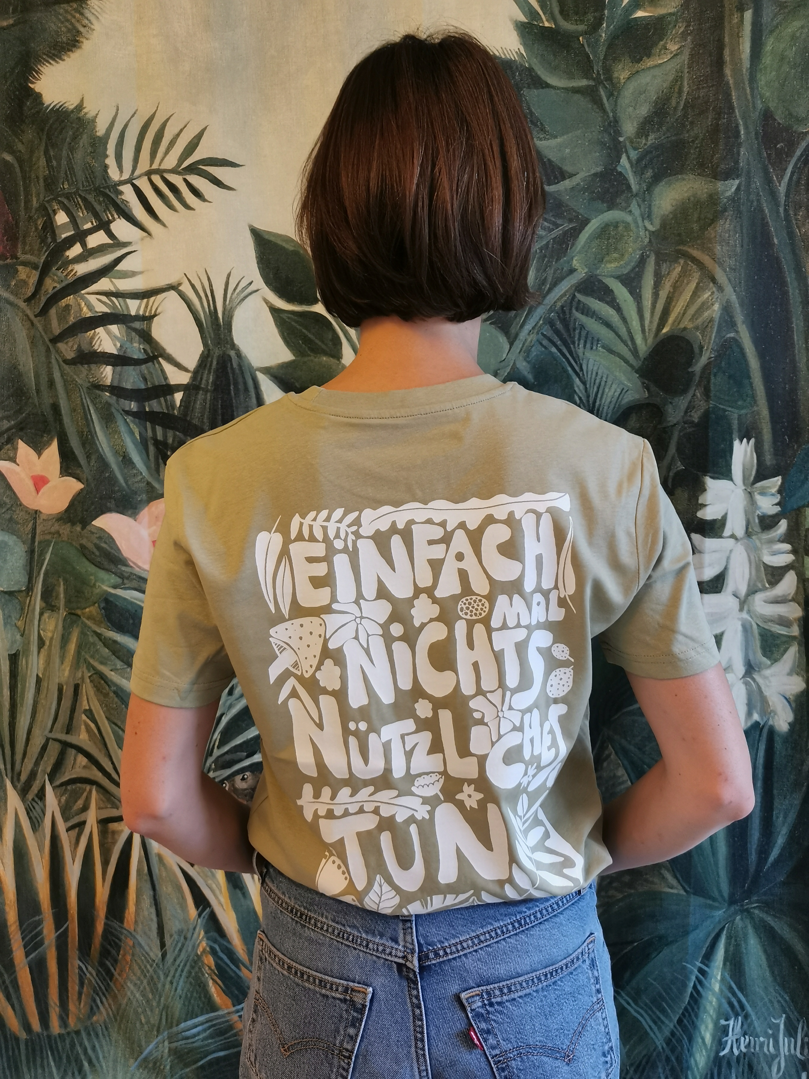 'Einfach mal nichts Nützliches tun' Fairfashion Unisex t-shirt mit Rückenprint